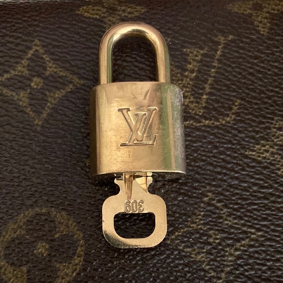 Louis Vuitton Accessories - Authentic Louis Vuitton lock& key set Shoulder bag/travel bag accessory #309.